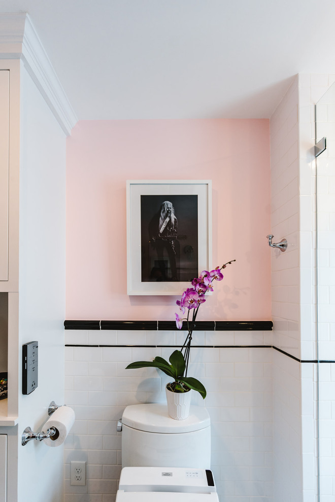 Design ideas for a small traditional master bathroom in Boston with an open shower, a bidet, black and white tile, subway tile, pink walls, porcelain floors, a pedestal sink, a hinged shower door and a shower seat.