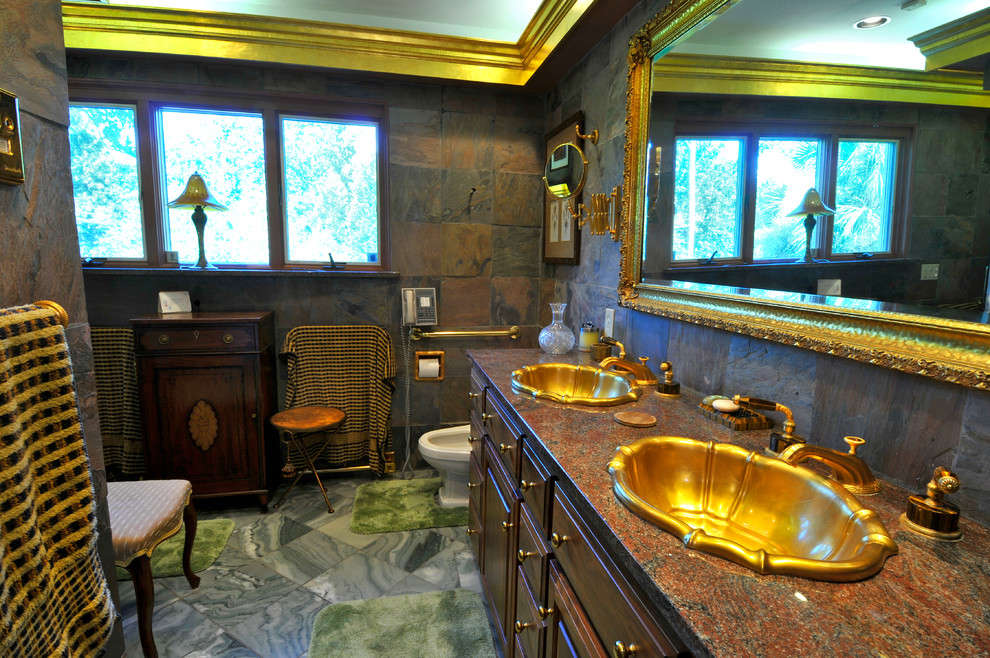 Example of a large transitional master multicolored tile coffered ceiling bathroom design in Charleston with dark wood cabinets, an undermount sink, granite countertops, multicolored countertops and a built-in vanity