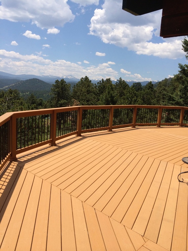 Large mountain style backyard balcony deck photo in Denver with no cover