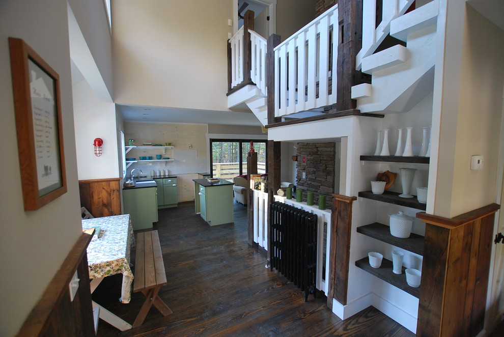Design ideas for a country kitchen in New York with flat-panel cabinets and green cabinets.