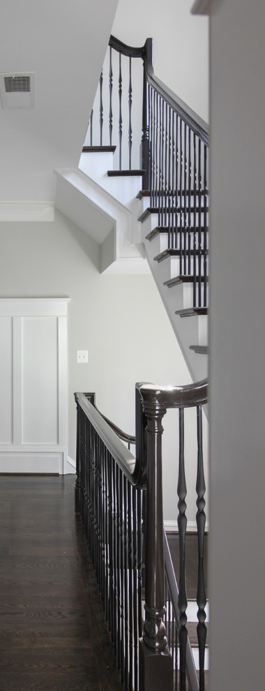 Large transitional wooden l-shaped mixed material railing staircase photo in DC Metro with painted risers
