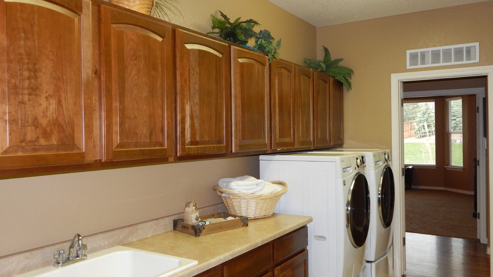 Laundry room - transitional laundry room idea in Denver