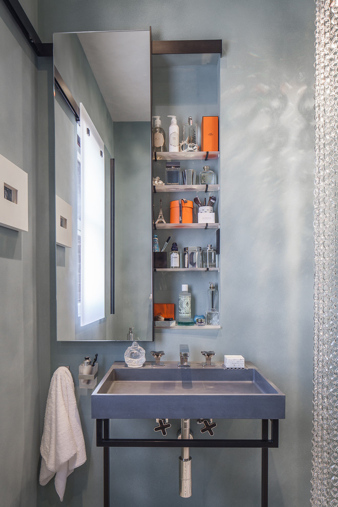 Inspiration for a contemporary powder room in San Francisco with a console sink and grey walls.