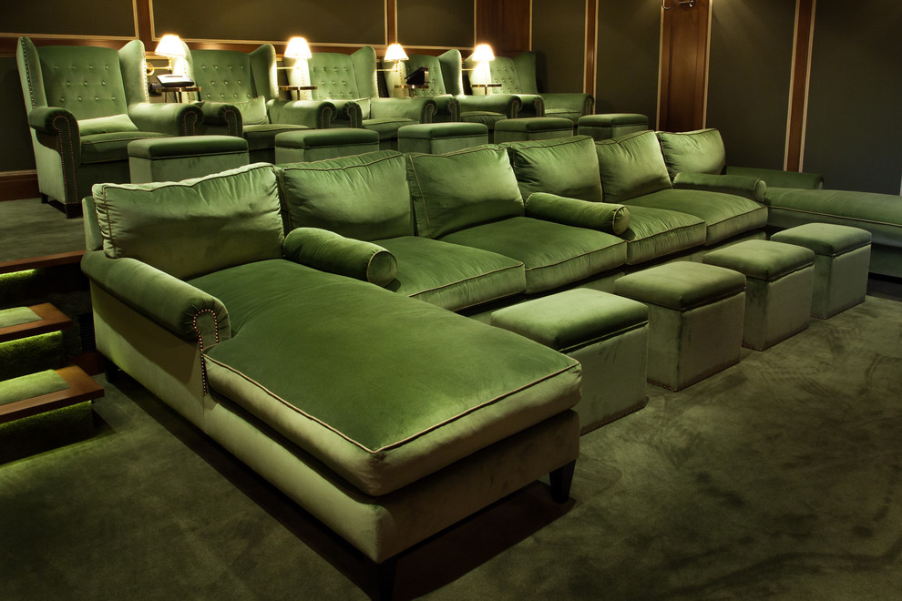Design ideas for a large traditional enclosed home theatre in Los Angeles with beige walls, carpet, a projector screen and green floor.