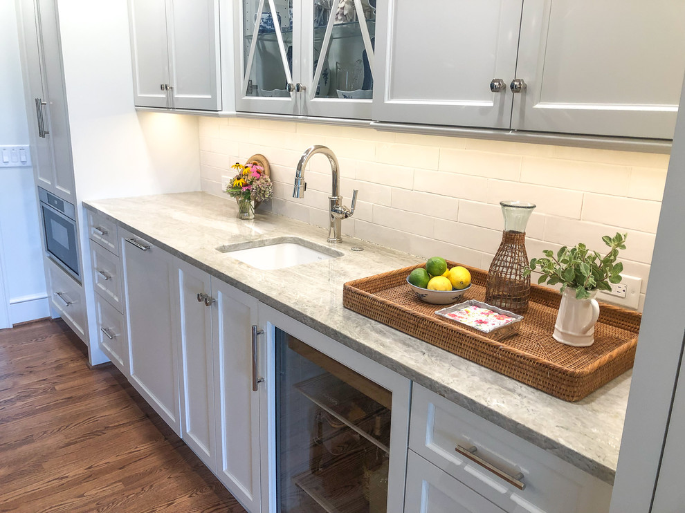 Kitchen - transitional kitchen idea with quartzite countertops and gray countertops
