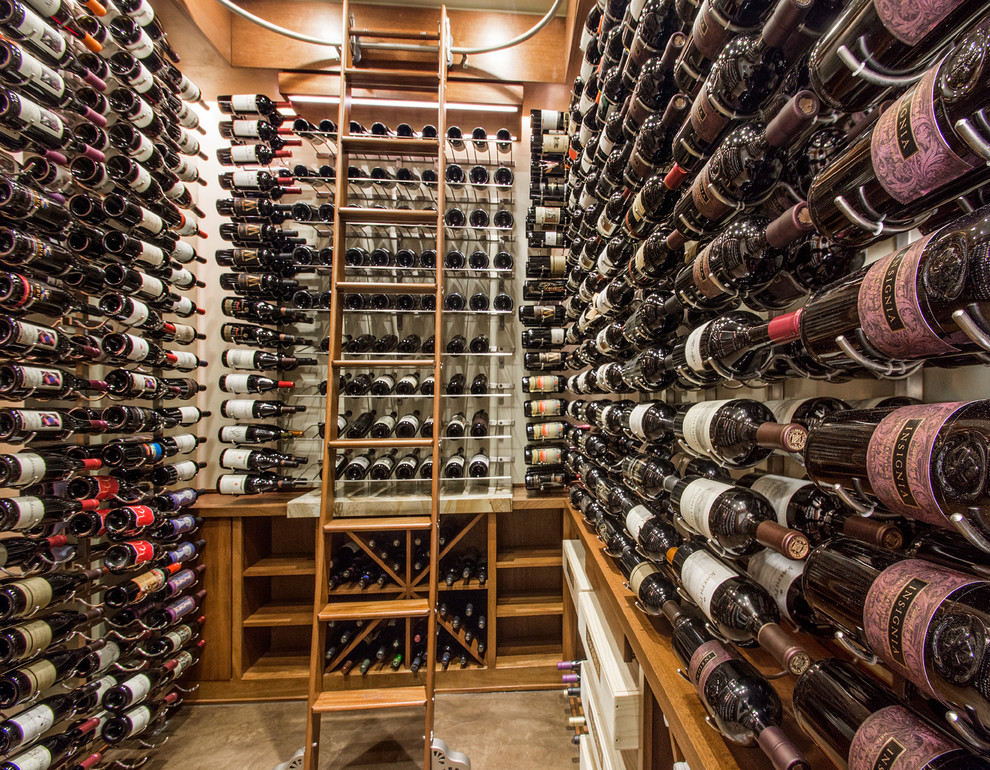 Design ideas for a large traditional wine cellar in Dallas with concrete flooring and storage racks.