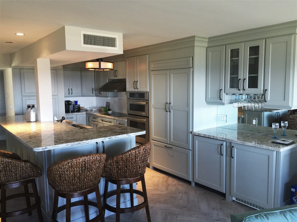 Example of a transitional kitchen design in Miami