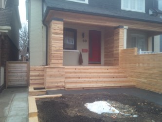 Mid-sized mountain style home design photo in Toronto