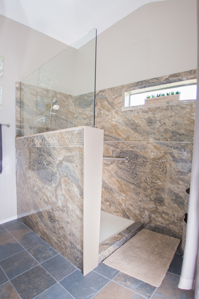 Photo of a mid-sized traditional 3/4 bathroom in Phoenix with raised-panel cabinets, white cabinets, an open shower, a one-piece toilet, beige tile, brown tile, gray tile, stone slab, purple walls, slate floors, an undermount sink and solid surface benchtops.