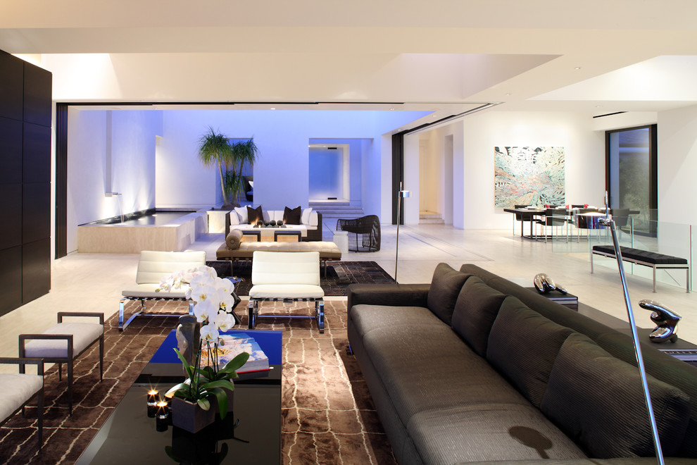 Photo of an expansive contemporary open concept living room in Los Angeles with white walls.