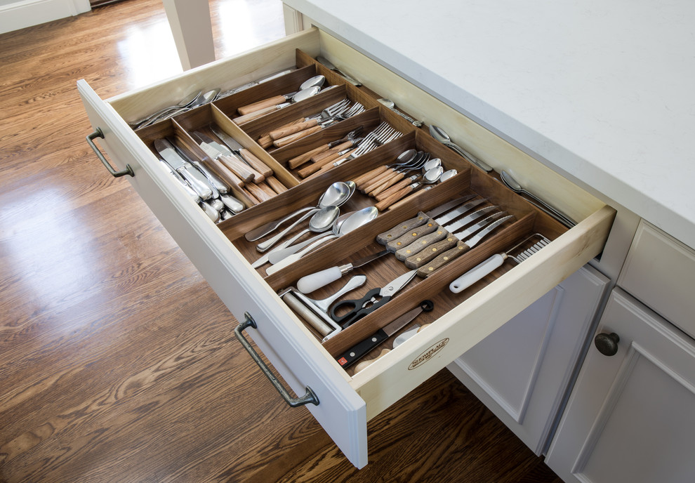 Eat-in kitchen - transitional galley dark wood floor eat-in kitchen idea in San Francisco with a single-bowl sink, recessed-panel cabinets, beige cabinets, quartz countertops, blue backsplash, ceramic backsplash, an island and white countertops