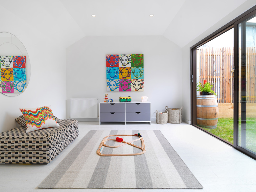 Contemporary gender-neutral kids' playroom in Melbourne with white walls and white floor.