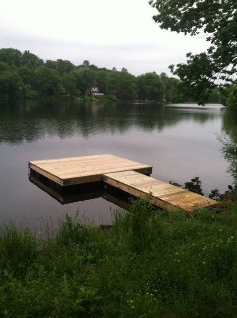 Dock - rustic backyard dock idea in New York