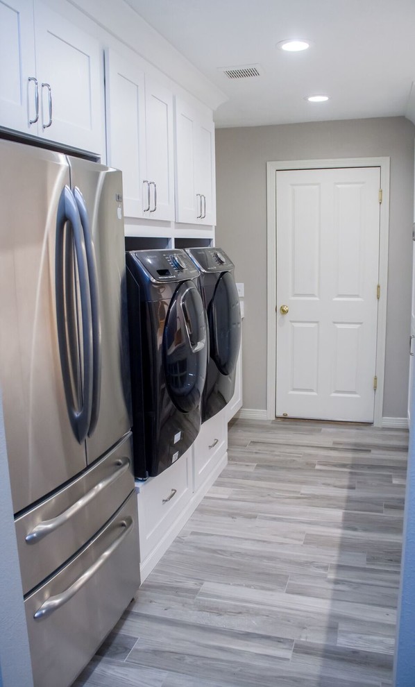 Transitional home design photo in Denver