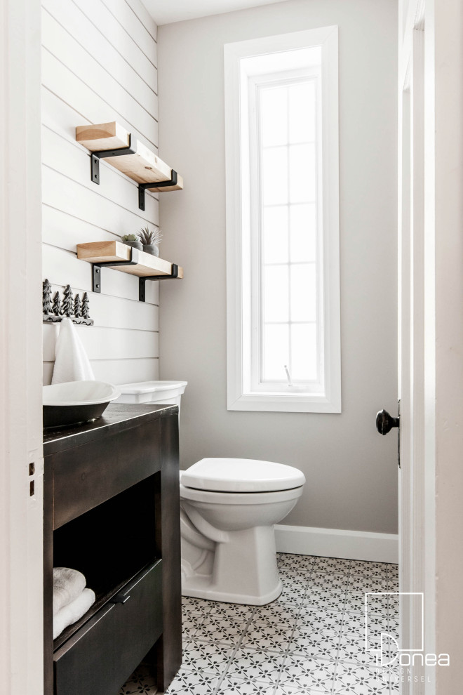 Design ideas for a small traditional 3/4 bathroom in Montreal with flat-panel cabinets, dark wood cabinets, a two-piece toilet, beige walls, porcelain floors, a vessel sink, wood benchtops, beige floor, brown benchtops, a single vanity, a freestanding vanity and planked wall panelling.