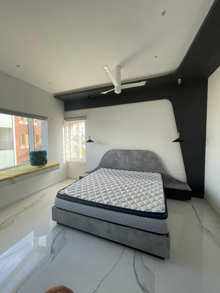 Inspiration for a contemporary bedroom remodel in Bengaluru