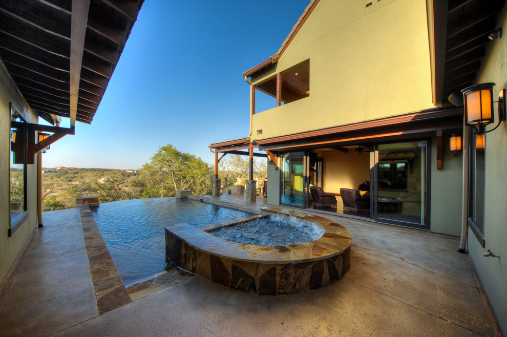 Inspiration for a rustic pool remodel in Austin