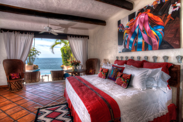 Photo of a tropical bedroom in Other.