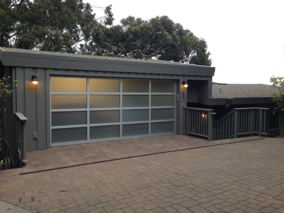 Design ideas for a large modern attached two-car garage in San Francisco.