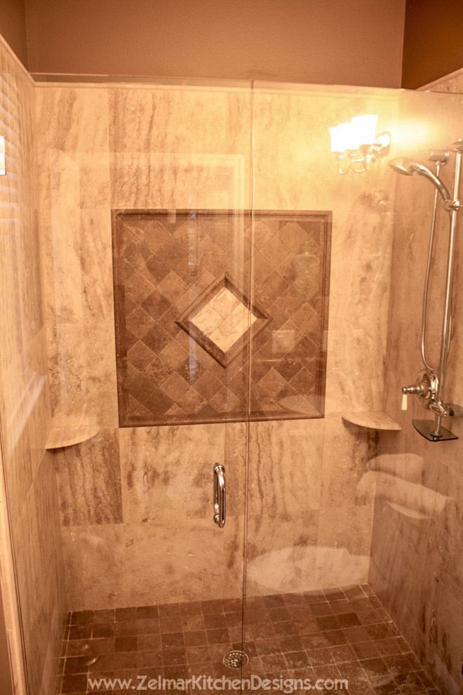Photo of an expansive traditional bathroom in Orlando with raised-panel cabinets, white cabinets and travertine floors.