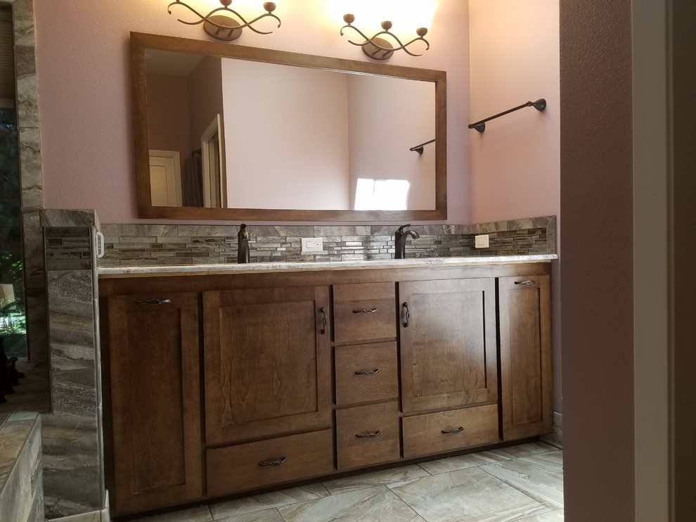 Inspiration for a mid-sized transitional master corner shower remodel with purple walls, an undermount sink, shaker cabinets, dark wood cabinets and an undermount tub