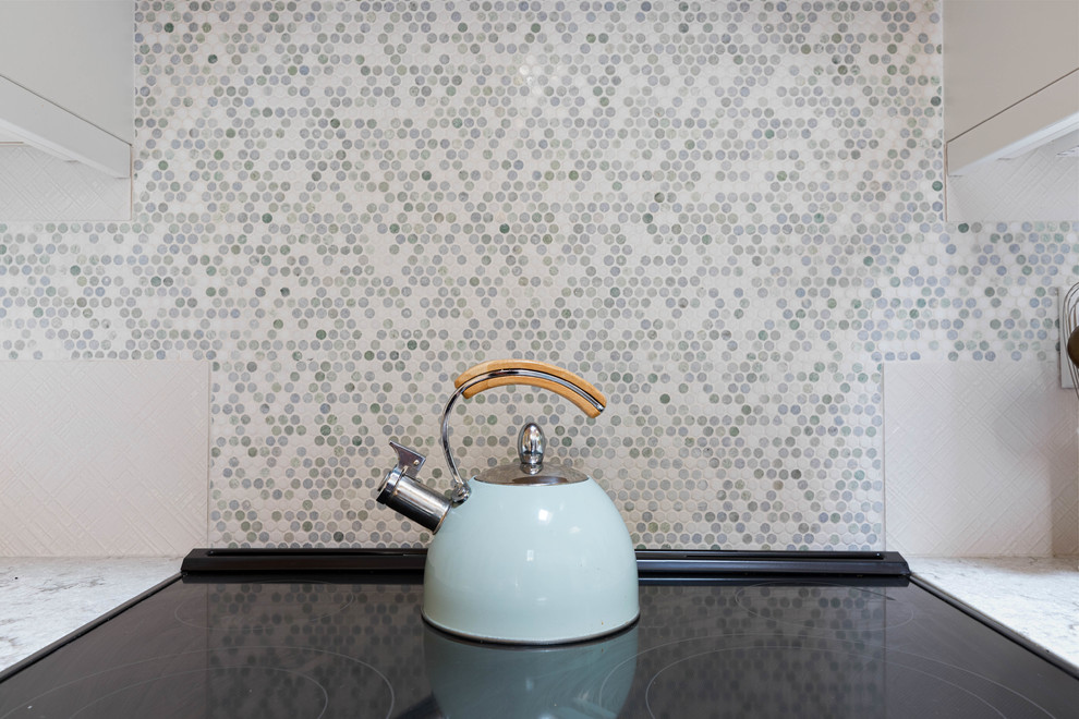 Example of a transitional kitchen design in Seattle