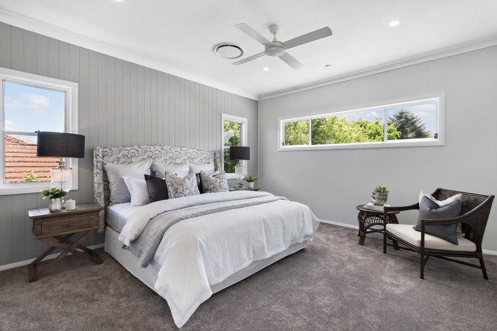 Design ideas for a transitional bedroom in Brisbane.