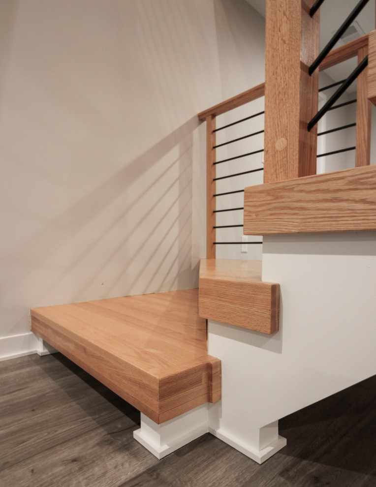 Inspiration for a small wood l-shaped staircase in DC Metro with mixed railing.