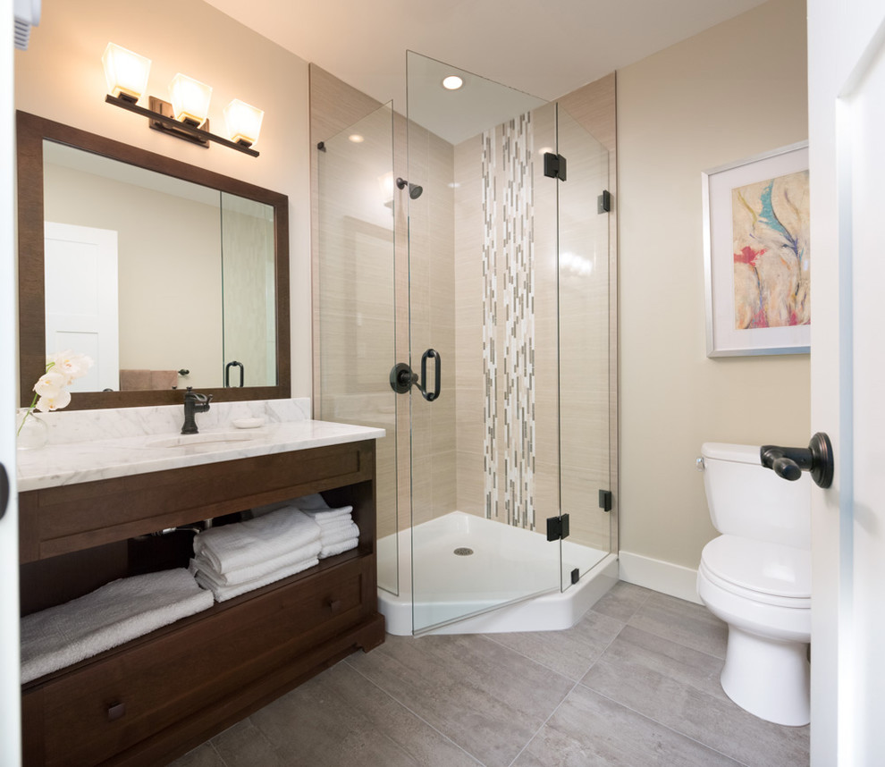 Mid-sized modern master bathroom in Toronto with beaded inset cabinets, dark wood cabinets, a corner shower, a one-piece toilet, multi-coloured tile, matchstick tile, beige walls, a drop-in sink and engineered quartz benchtops.
