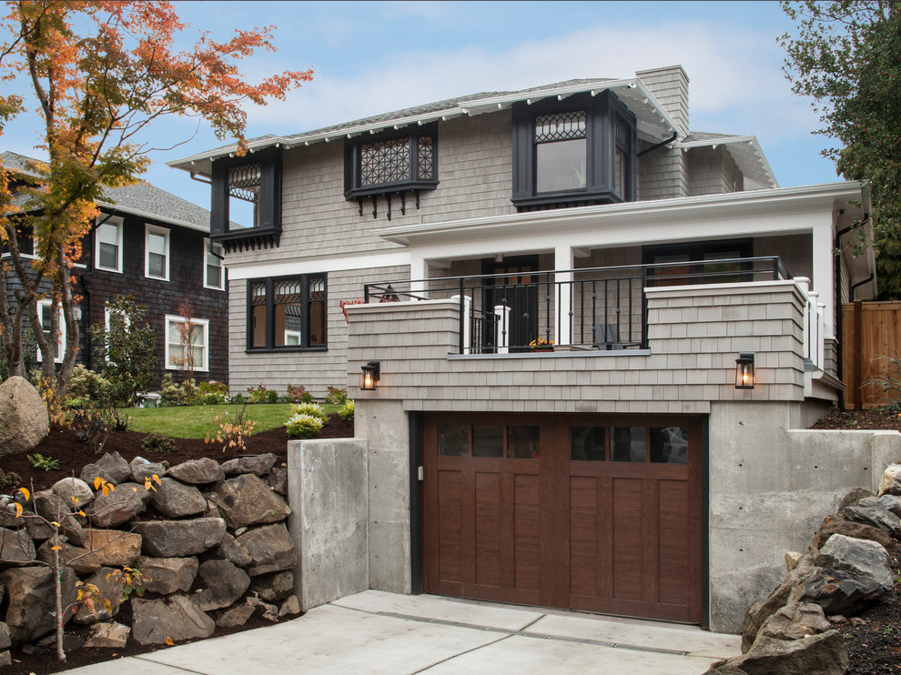 Photo of a large traditional attached two-car garage in Seattle.