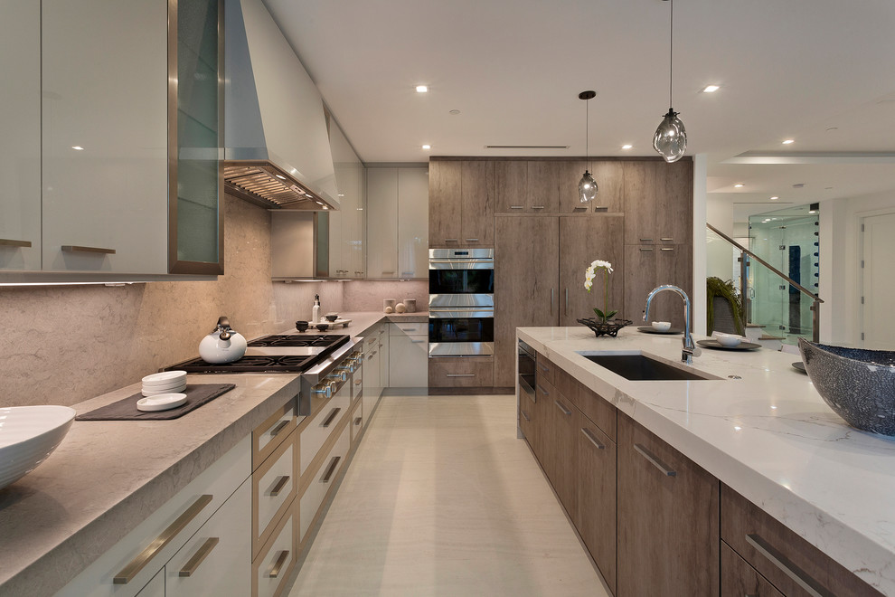 Inspiration for a mid-sized contemporary l-shaped open plan kitchen in Other with an undermount sink, flat-panel cabinets, dark wood cabinets, marble benchtops, multi-coloured splashback, marble splashback, stainless steel appliances, light hardwood floors, with island, beige floor and multi-coloured benchtop.