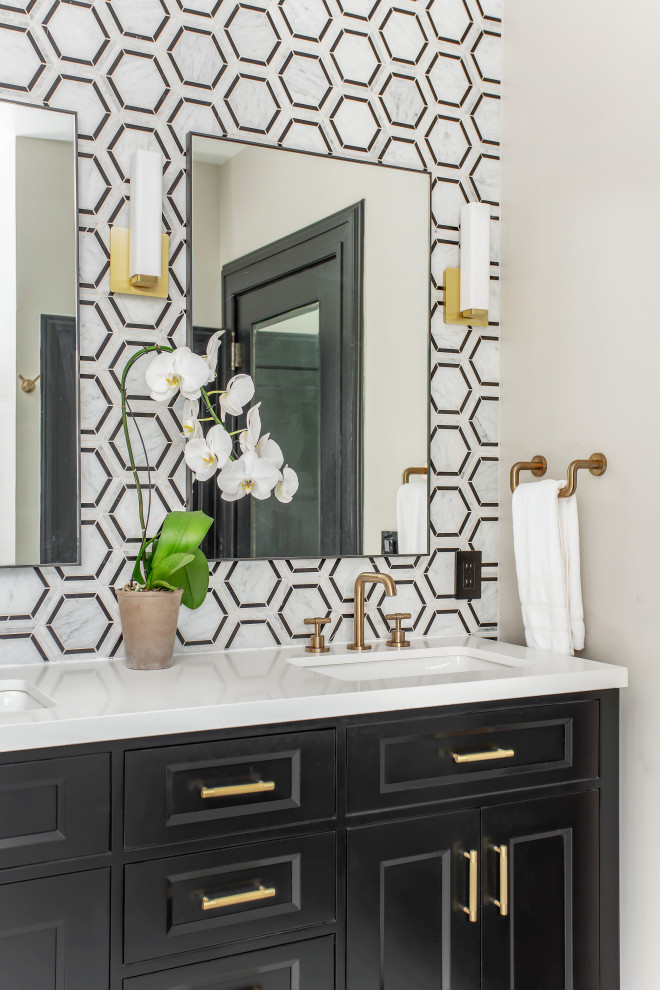 Mid-sized transitional 3/4 bathroom in Dallas with furniture-like cabinets, black cabinets, an alcove shower, a two-piece toilet, black and white tile, marble, white walls, marble floors, an undermount sink, engineered quartz benchtops, white floor, a hinged shower door and white benchtops.