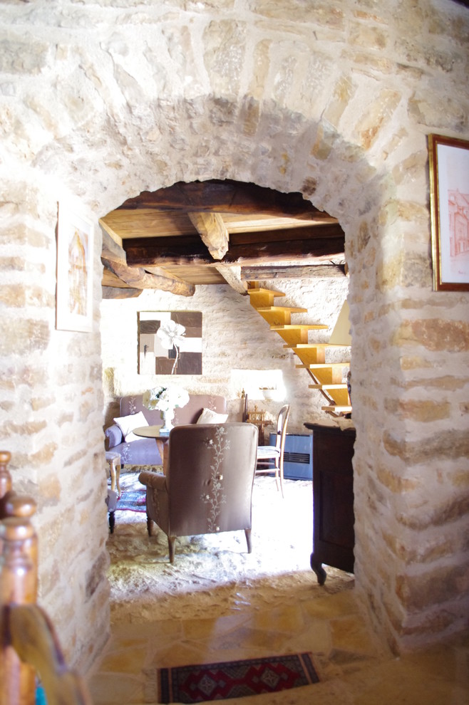 Inspiration for a mid-sized country loft-style living room in Marseille.