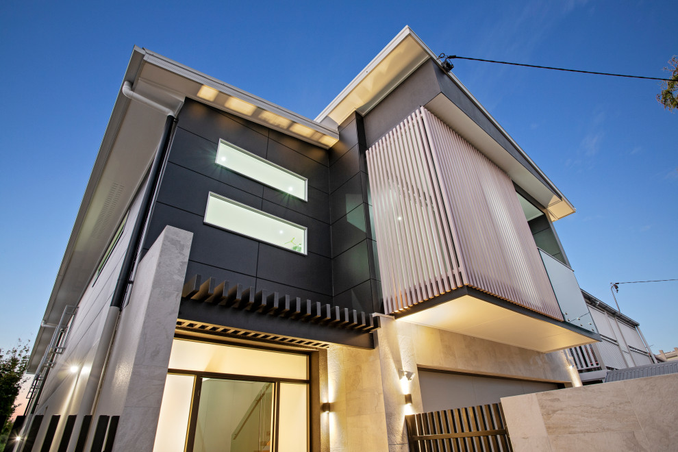 Design ideas for a modern two-storey house exterior in Brisbane.