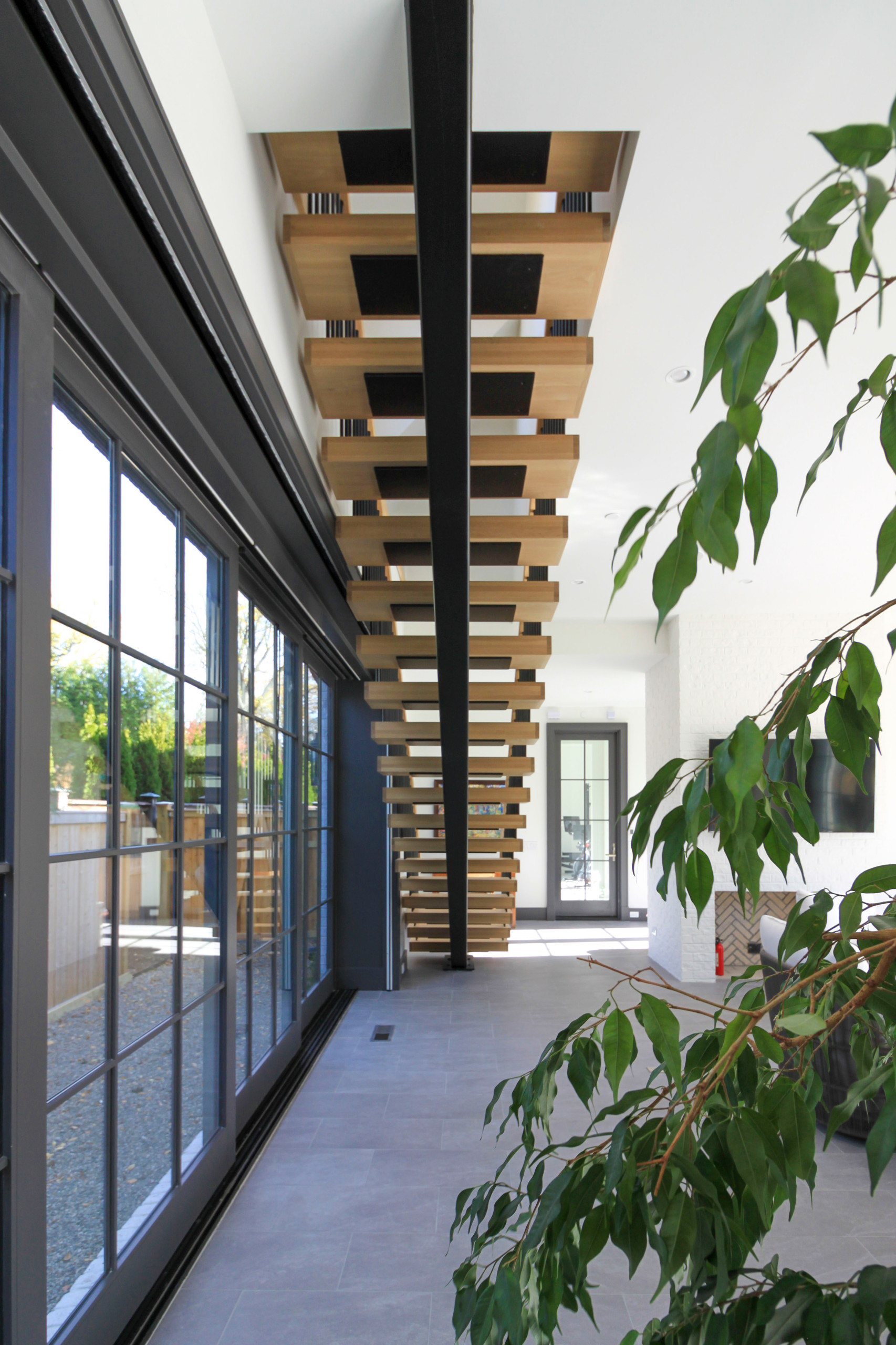96_Dramatic cantilevered no-riser staircase, Bethesda, MD 20814