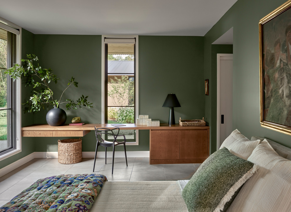 Large country porcelain tile and gray floor bedroom photo in Other with green walls