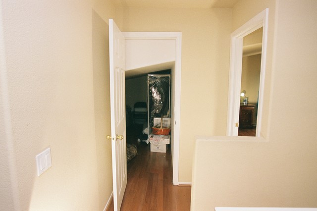 Storage Space Built Under Sloped Ceiling Traditional Wardrobe