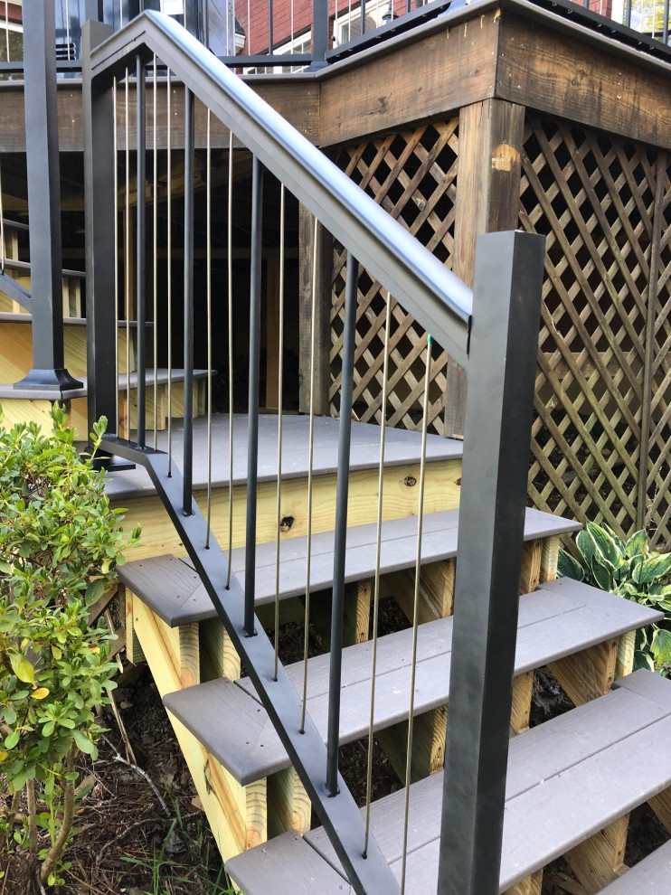 Photo of a large bohemian back first floor metal railing terrace in Nashville with an outdoor kitchen and no cover.