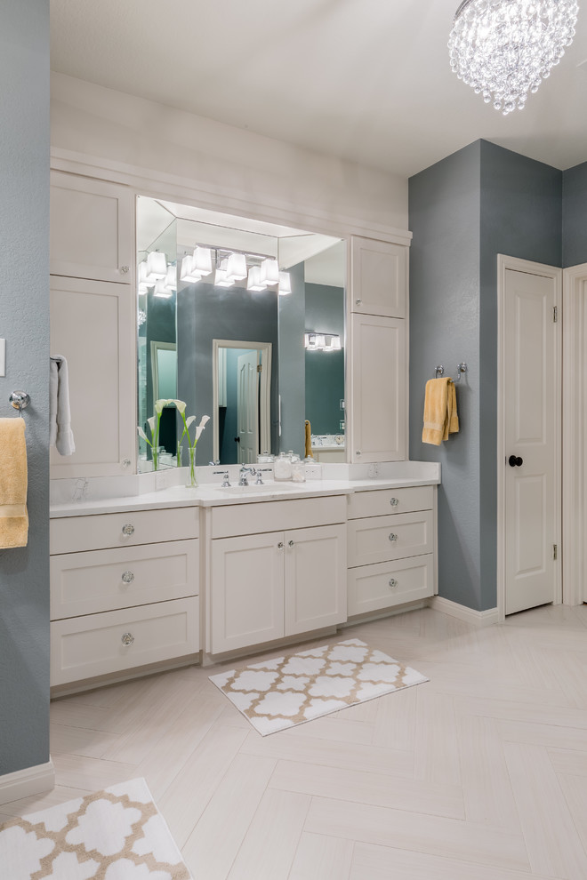 Mid-sized transitional master white tile and ceramic tile porcelain tile corner shower photo in Austin with shaker cabinets, white cabinets, an undermount tub, gray walls, an undermount sink and quartz countertops