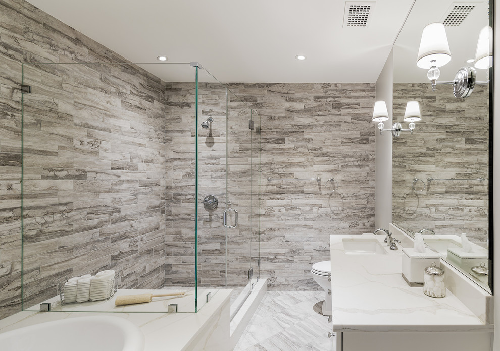Photo of a transitional master bathroom in DC Metro.