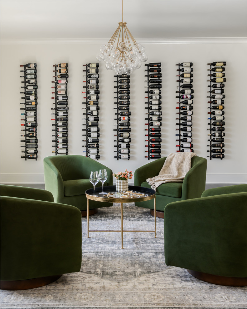 Inspiration for a large transitional painted wood floor and black floor wine cellar remodel in New York with storage racks