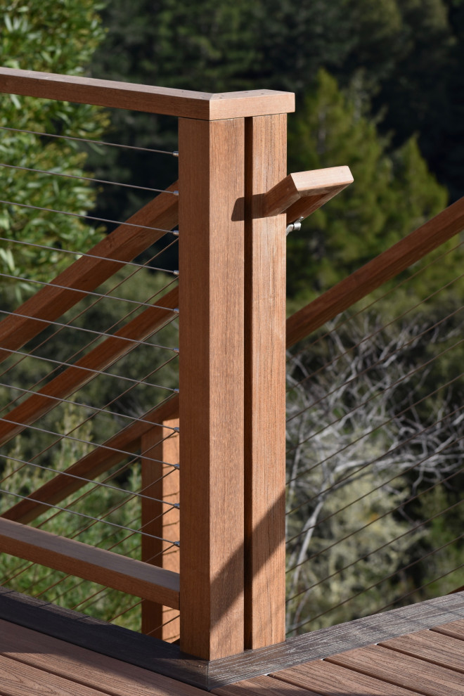 Inspiration for a modern backyard second story cable railing deck remodel