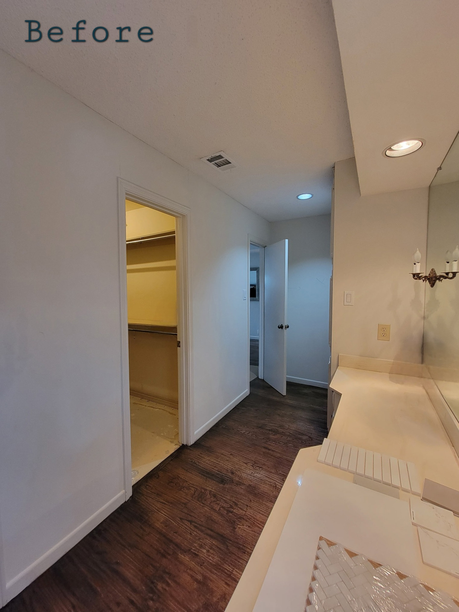 Two separate bathrooms converted into a master bathroom with a big open closet