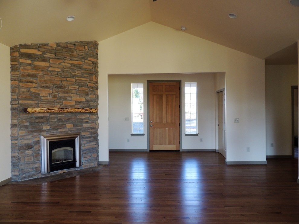 Entry hall - small transitional light wood floor entry hall idea in Seattle with beige walls and a light wood front door