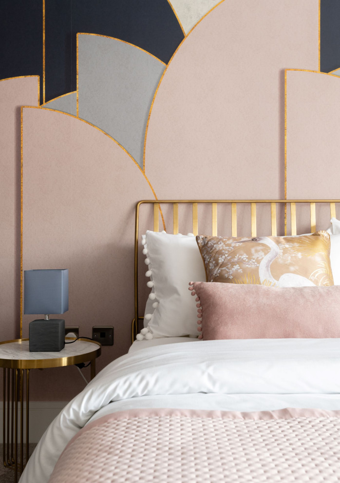 Mid-sized trendy guest carpeted, gray floor and wallpaper bedroom photo in London with pink walls