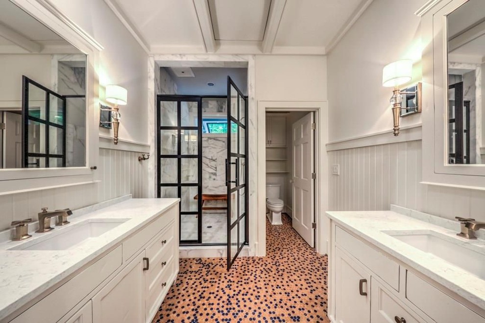 Small eclectic master bathroom in Atlanta with recessed-panel cabinets, white cabinets, an alcove shower, a two-piece toilet, white tile, marble, white walls, cork floors, an undermount sink, engineered quartz benchtops, beige floor, a hinged shower door and white benchtops.