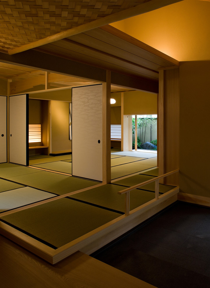 Asian entryway in Other with tatami floors.