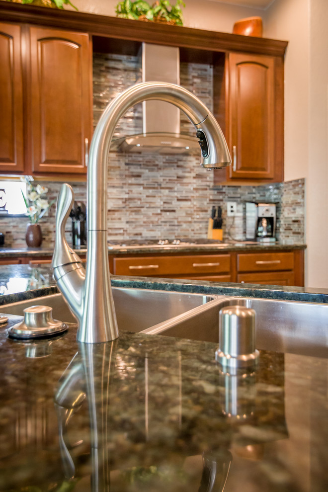 Mid-sized minimalist u-shaped ceramic tile and beige floor open concept kitchen photo in Sacramento with a double-bowl sink, raised-panel cabinets, medium tone wood cabinets, granite countertops, multicolored backsplash, matchstick tile backsplash, stainless steel appliances and a peninsula
