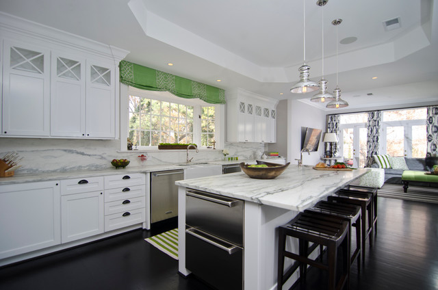 Kitchen - transitional dark wood floor kitchen idea with a farmhouse sink, shaker cabinets, white cabinets, marble countertops, gray backsplash, stainless steel appliances and an island