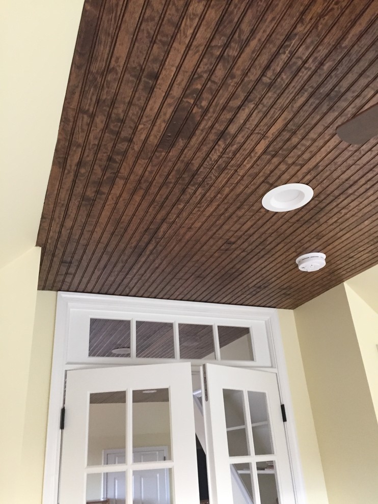 Inspiration for a large timeless loft-style vinyl floor home design remodel with yellow walls